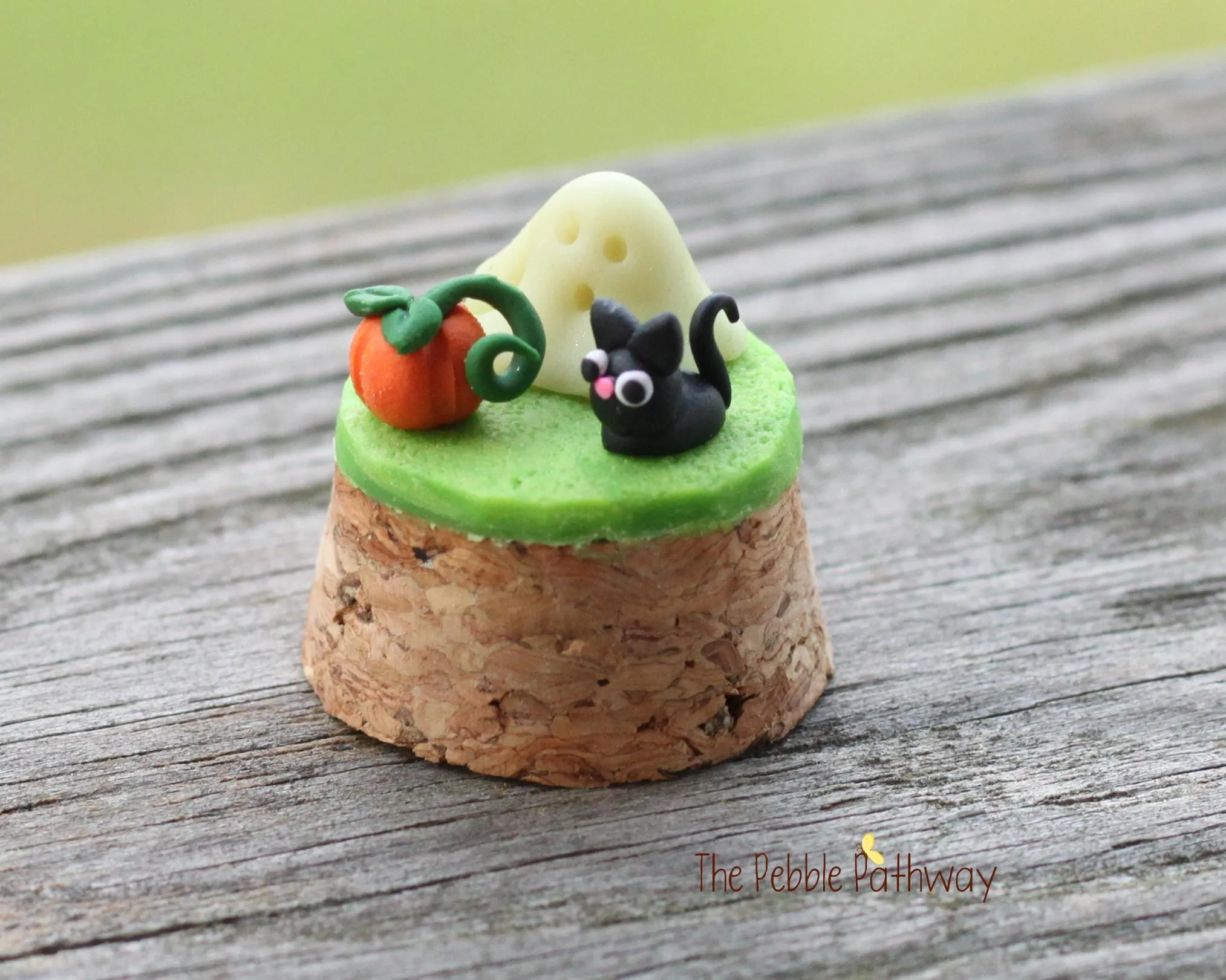 Micro Black cat, glow in the dark ghost, and tiny pumpkin in tiny cloche