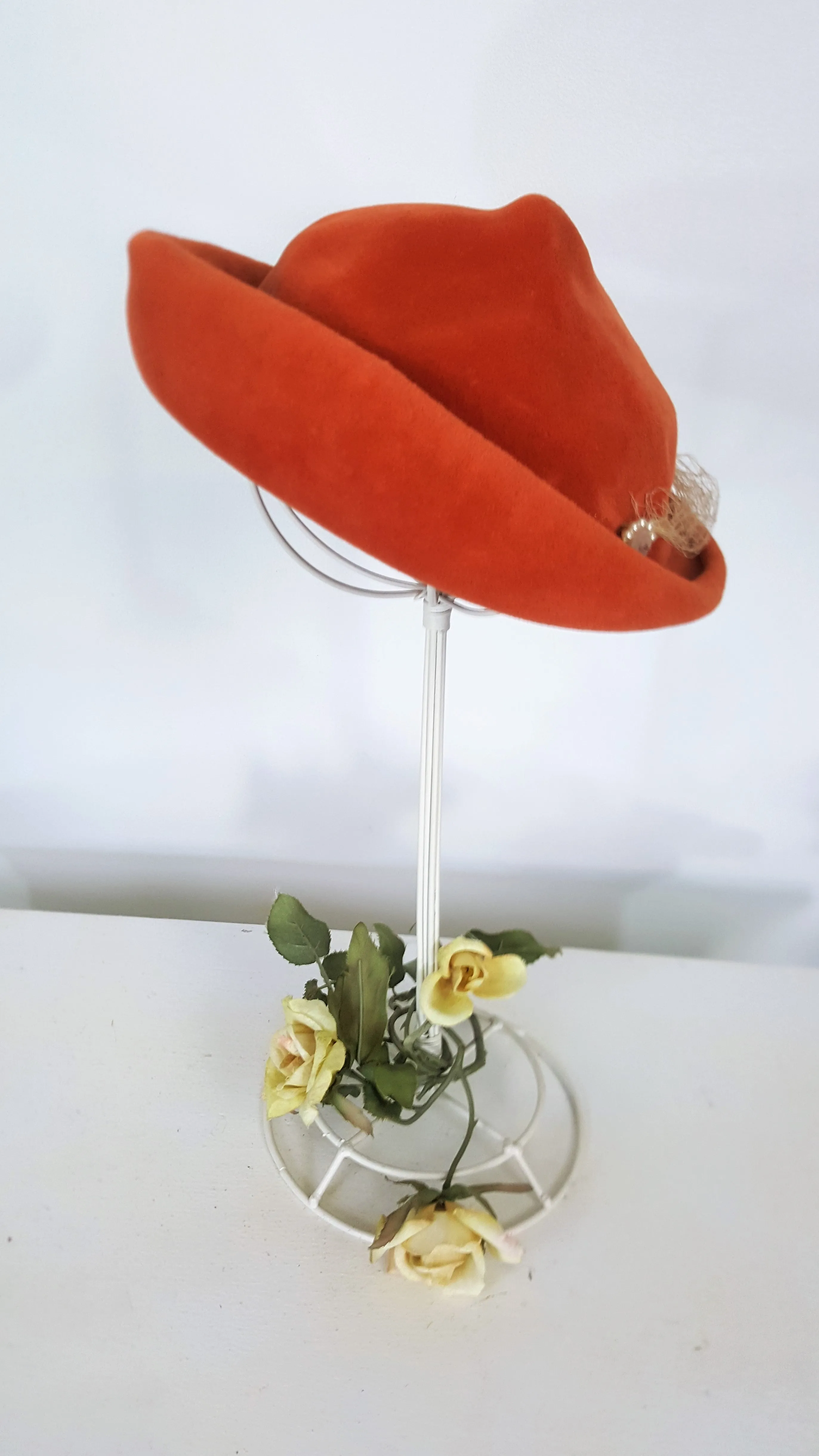 Vintage 1950s Dark Orange Wool Felt Hat with Birdcage Veil And Pearl Trim